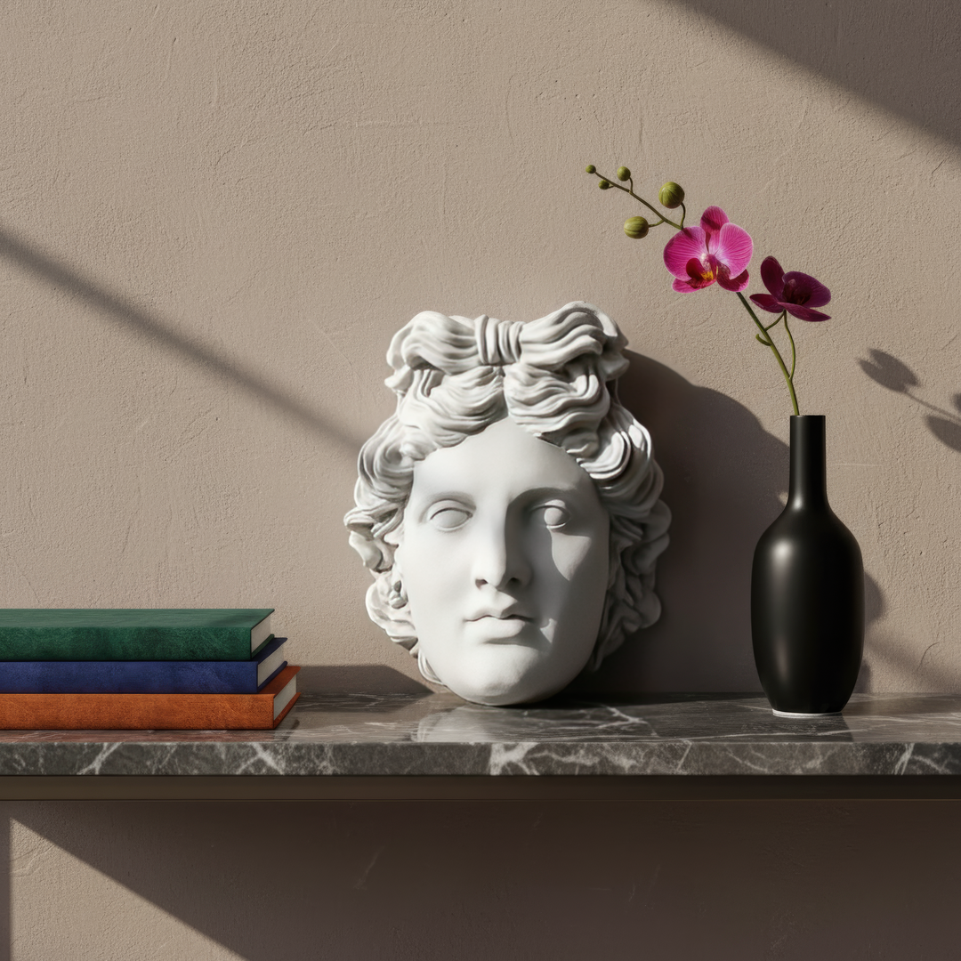 “Handmade Apollo sculpture placed on a textured wall in a bohemian interior with soft natural lighting and dried florals — blending ancient art with modern serenity.”
TR:
“Yumuşak doğal ışık ve kuru çiçeklerle süslenmiş bohem bir iç mekanda, dokulu duvar üzerinde sergilenen el yapımı Apollo heykeli — antik sanatı modern huzurla buluşturur.”