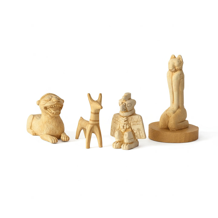 Ancient Animal Guardian Set featuring four handmade archaeological replicas — Aztec Condor Warrior, Urartian Lion, Mycenaean Dog, and Marco Cat. Museum-quality handcrafted sculptures symbolizing protection and ancient spirituality. Designed and produced by ArkeoArt.