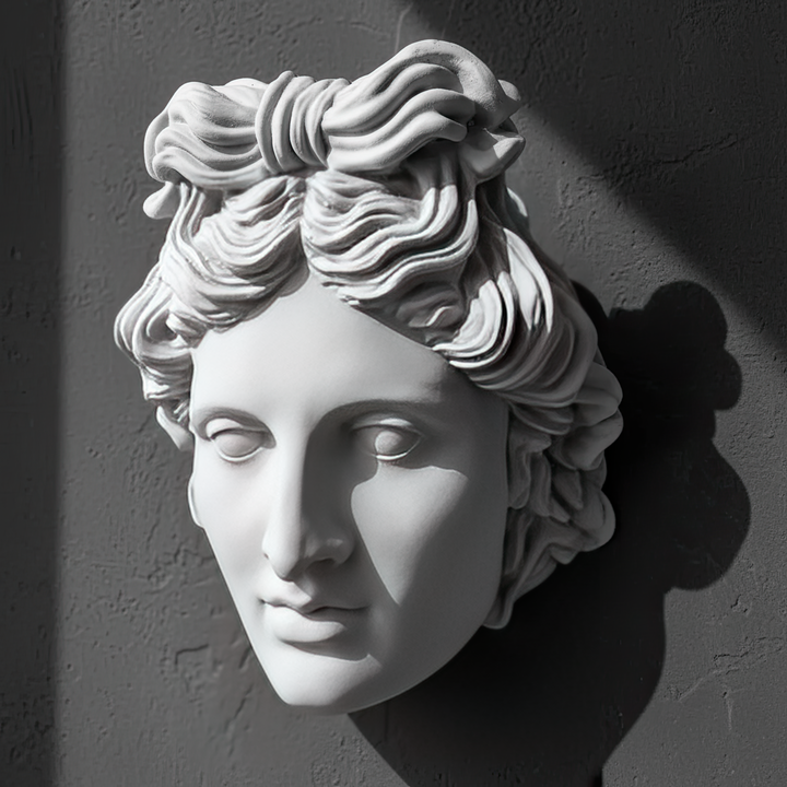 “Side-angle photograph of the Apollo bust showing its sculptural depth, smooth lines, and refined shadow play — ideal for art galleries and classic wall art enthusiasts.”
TR:
“Apollo büstünün heykelsi derinliğini, yumuşak hatlarını ve gölge oyunlarını gösteren yan açı fotoğrafı — sanat galerileri ve klasik duvar sanatı tutkunları için idealdir.”